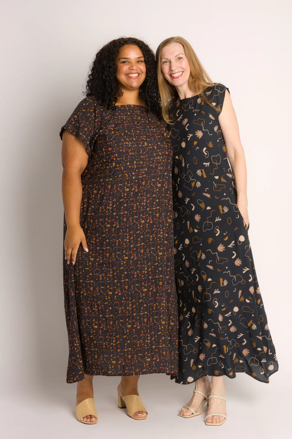 Women wearing the Garden Dress sewing pattern from 奥州五开奖官网开奖号 Cris Wood Sews on The Fold Line. A dress pattern made in cotton, linen, gauze, viscose, cupro, rayon, cotton jacquard, or silk fabric, featuring a square neckline, grown-on short sleeves, A-line skirt, side seam pockets, and midi length.